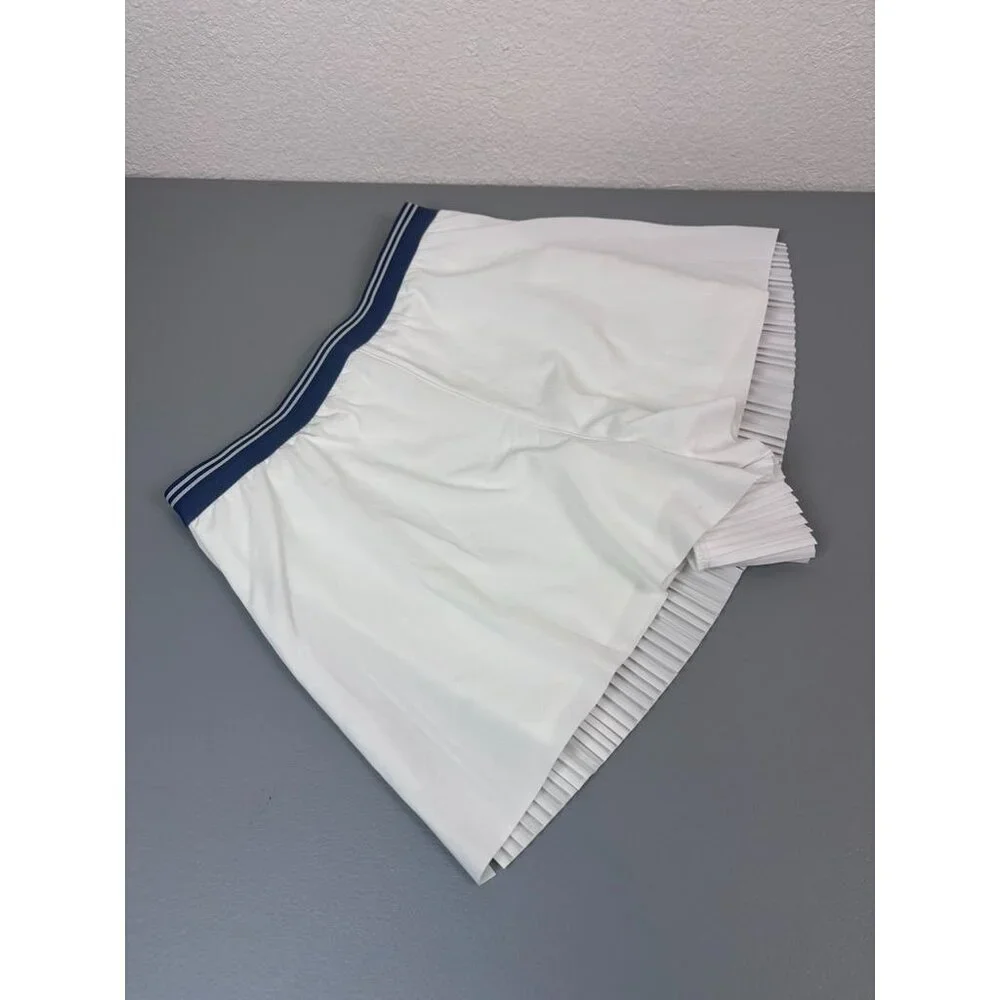 Athleta Girl medium 8-10 white pleat back flowy‎ athletic tennis shorts